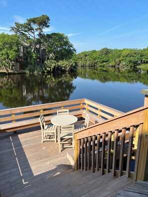 Dock with table, chairs, and bench seating
