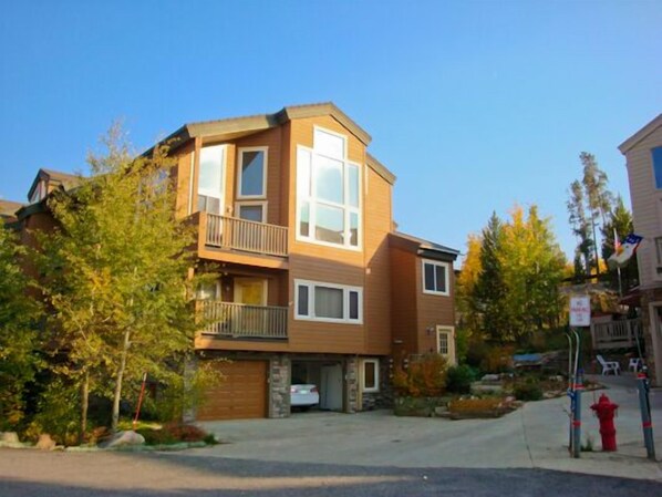 Freshly painted and re-roofed Condo with stone facade at bottom