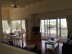 Upstairs living area, lounge dining and large deck with ocean views.