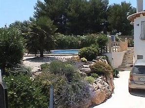 private pool and rockery, driveway