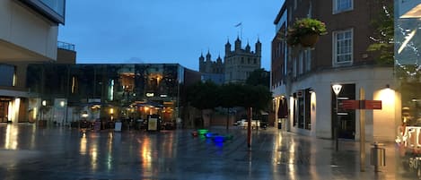 The apartment building at night with views over to Exeter Cathedral