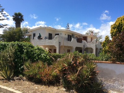 beautiful apartment in villa, private beach with umbrellas and sunbeds