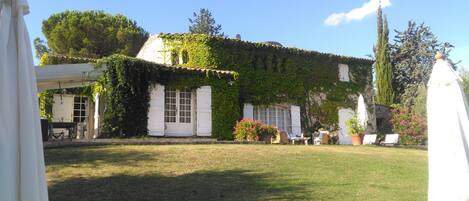 Left to right: outside dining, terrace and glimpse of cottage