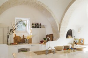 The large kitchen with island unit.