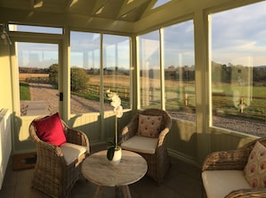 Sun porch to enjoy a morning coffee and take in incredible views