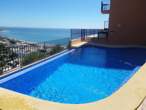 The pool with spectacular sea, mountain and village views