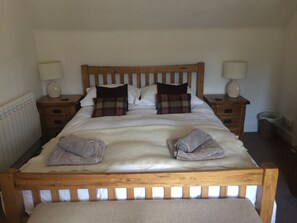 The master bedroom with ensuite shower room has views over the River Oich 