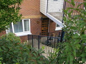 Down the steps from your own parking place to your private front door. Peaceful.