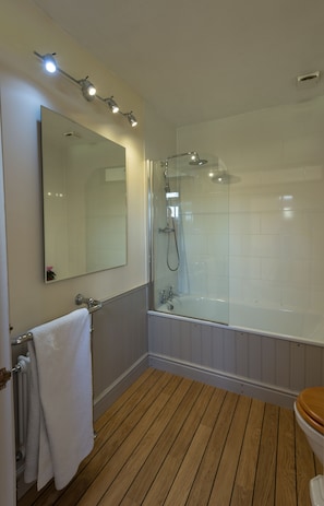 The newly refurbished en-suite bathroom with shower and bath.