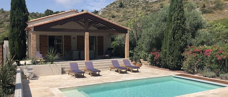 Secluded villa with private pool,  south  facing natural travertine terrace.