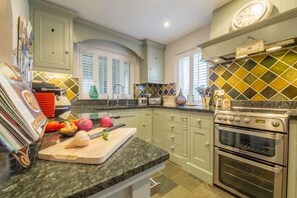 Ground floor: Kitchen with electric oven and gas hob