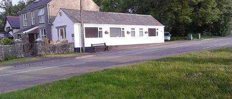 Side view of The Old Shop from the green.