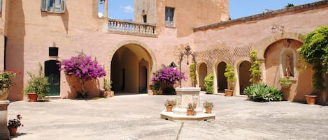 The courtyard with a well in the centre