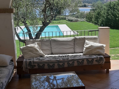 CANNIGIONE - WOHNUNG MIT POOL IN VILLA FRONTE MARE 