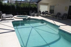 Pool, spa and outdoor dining area