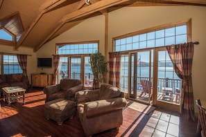 Living room with panoramic views of the lake!