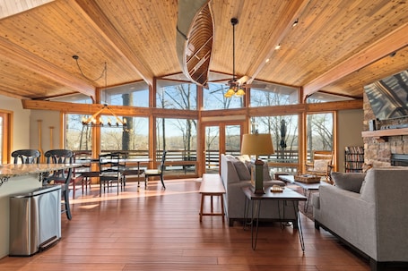 Open living area with floor to ceiling windows overlooking Kentucky Lake.