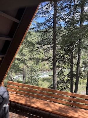 Charcoal weber grill and a river view for relaxing with your loved ones.