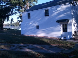 apartment on 2nd floor of this newly sided building. Deck to the right.