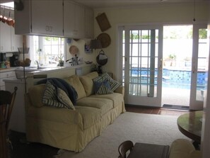 Family room, kitchen and pool area