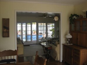 View from breakfast nook through family room to pool area