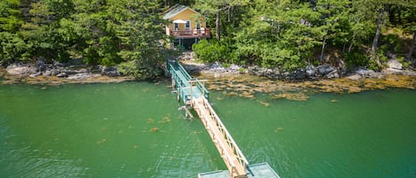 Aerial view of cottage & dock. Another cottage next door, not shown in photo