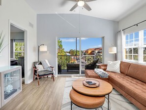 Great lighting over the corner leather chair. Couch has lighting and power strip