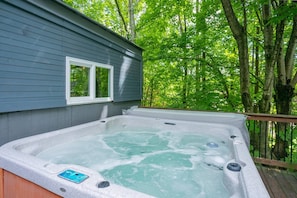 Secluded back yard and hot tub.