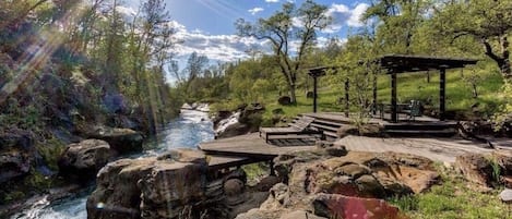 Create memories here: creekside deck on private waterfall and swimming holes.