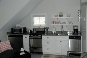 Full Kitchen
Frig/Freezer,  stove/oven, micro wave, toaster, coffee dishwasher