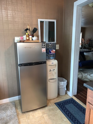 Great apartment sized fridge and endless bottled water!