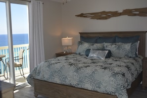 Master Bedroom with King bed and private entrance to balcony.