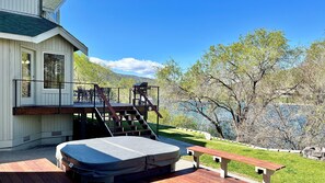 Hot tub, located on the cottage deck looking toward main house