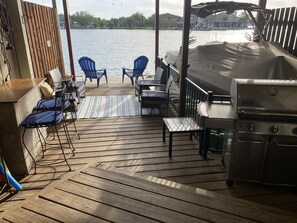 The downstairs dock is the place to be for happy hour with its easy access to the kitchen and to the wonderful lake water.