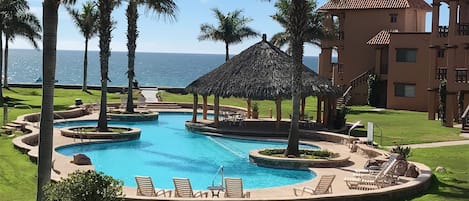 Pool and ocean right outside condo. View from Patio.