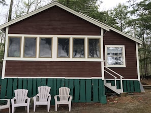 Cottage (storm windows will be removed, revealing a screened-in eating porch.)