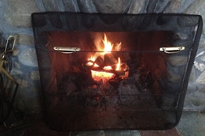 Enjoy an evening fire in the field-stone fireplace.