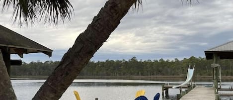 Absolute Paradise. Enjoy sitting by the water under the Tiki Hut!