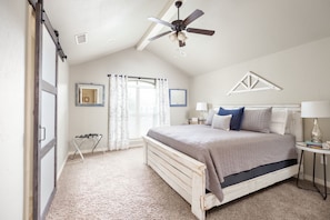 Master suite features a plush pillow top king size bed with lots of pillows