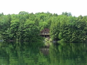 View of cabin from paddle boat on Perch Pond