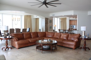 travertine floors and high end appliances compliment the open floor plan