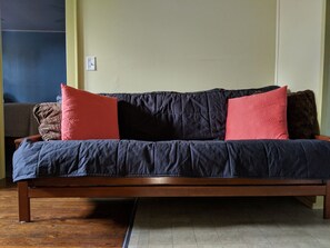 Futon folds down to sleep 2.