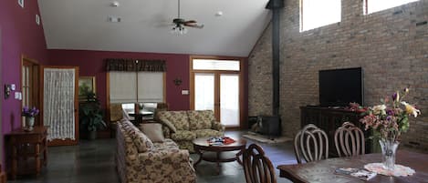 An interior view shows the Slate tile floors and open floor plan.