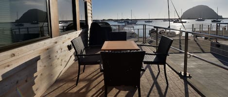 This unit has an amazing bayfront patio with grill and table a chairs.