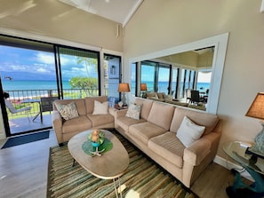 A wall of windows provides unobstructed views of the ever-changing ocean.