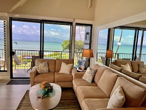 Comfortable living room area. Vaulted ceiling. Panoramic ocean views.