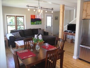 Sunny upstairs kitchen and living room. Incredible views! from all directions.