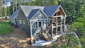 Rear of house facing lake, multiple decks, 4 burner Weber Gas Grill, Sunset View