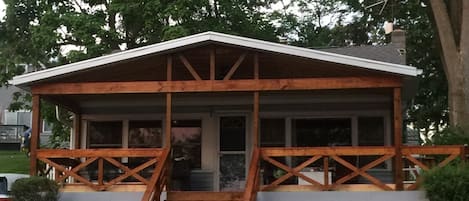 New covered deck makes lake view wonderful rain or shine.