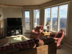 The living room provides a great view of the mountains, plus a 55" HDTV.
